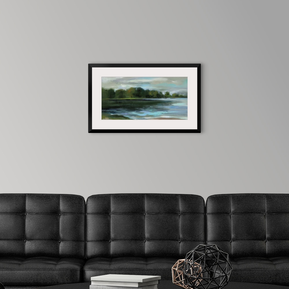 A modern room featuring Contemporary landscape painting of a lakeside lined with trees.