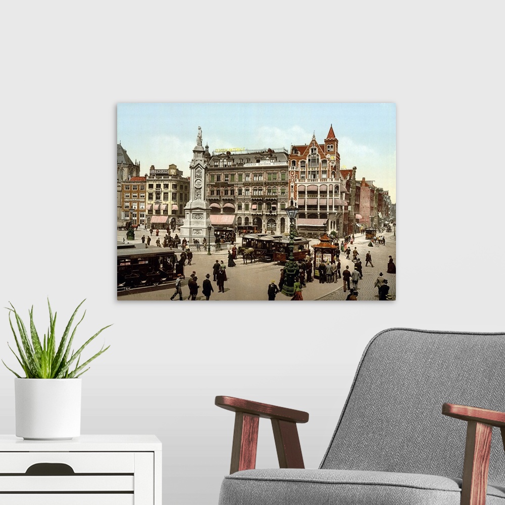 A modern room featuring Photomechanical print dated to 1900, depicting the west end of Dam Square in Amsterdam. Horse dra...