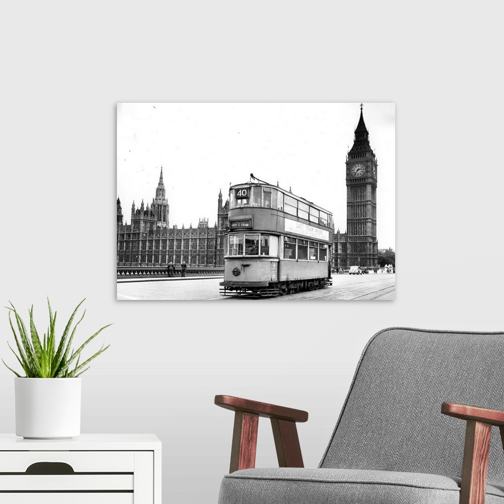 A modern room featuring One of the last trams to run in London going over Westminster Bridge  Big Ben can be seen in the ...