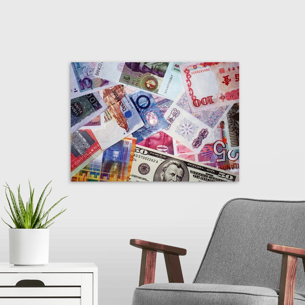 A modern room featuring Pile of International Currency