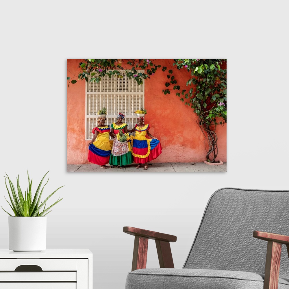 A modern room featuring Colourful Palenqueras selling fruits on the street of Cartagena, Bolivar Department, Colombia (MR).
