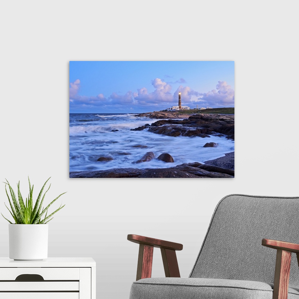 A modern room featuring Uruguay, Rocha Department, Cabo Polonio, Lighthouse at nightfall.