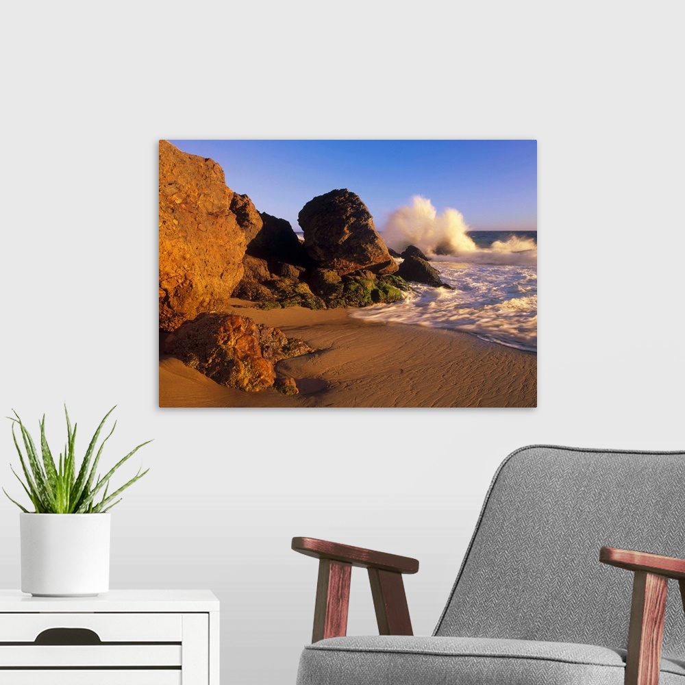 A modern room featuring Waves crashing on Point Dume Beach, California