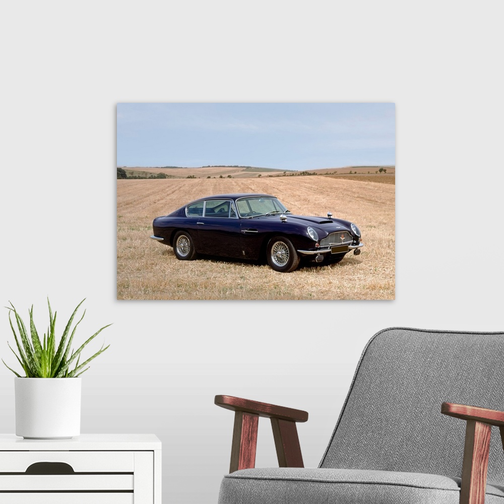 A modern room featuring 1967 Aston Martin DB6, 4.0 litre saloon. Country of origin United Kingdom.