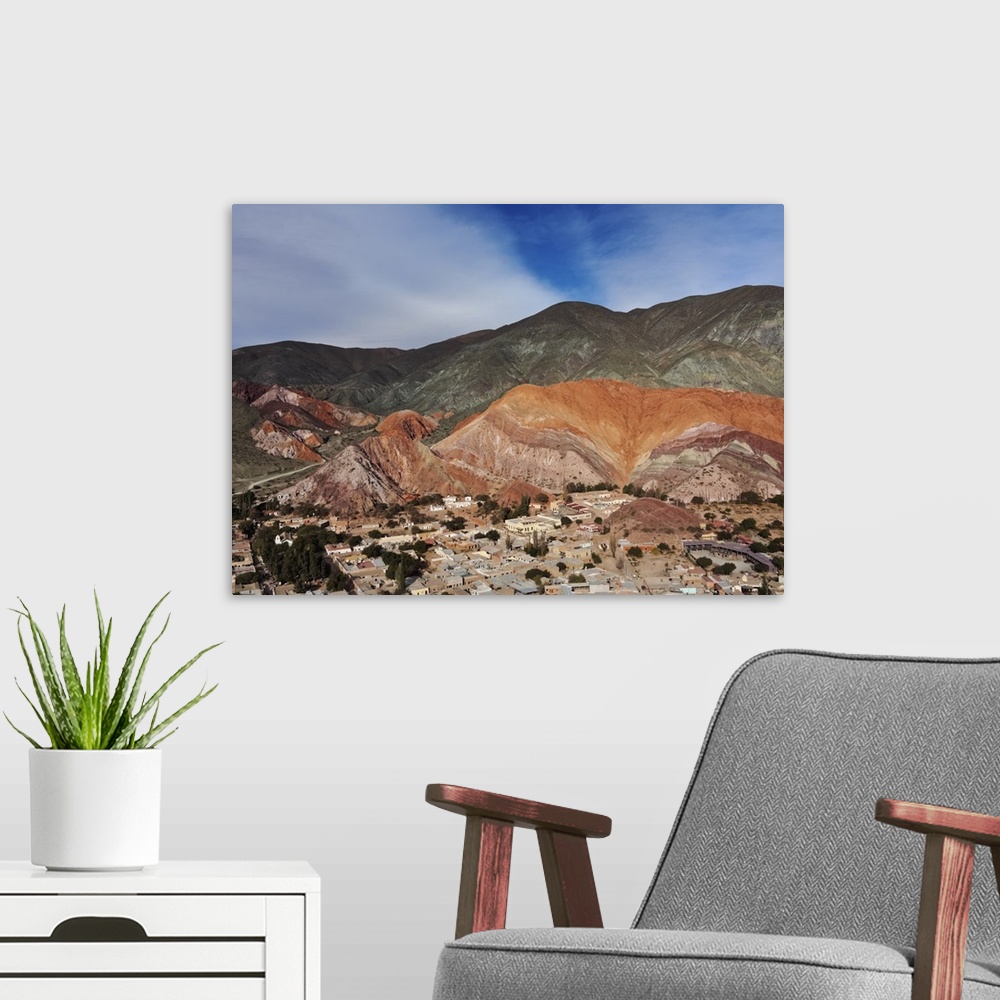 A modern room featuring Elevated view of the town and the Hill of Seven Colours (Cerro de los Siete Colores), Purmamarca,...