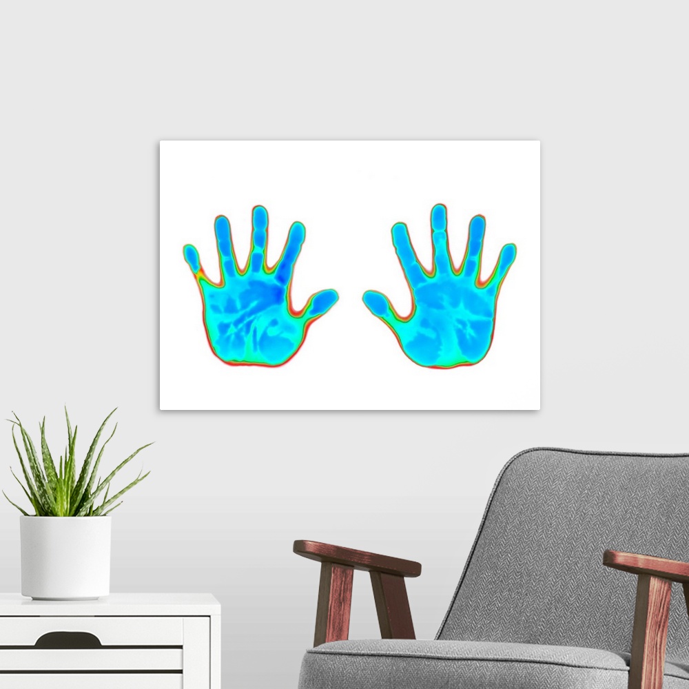 A modern room featuring Image of hands produced on thermochromic film. Thermochromic materials use liquid crystal technol...