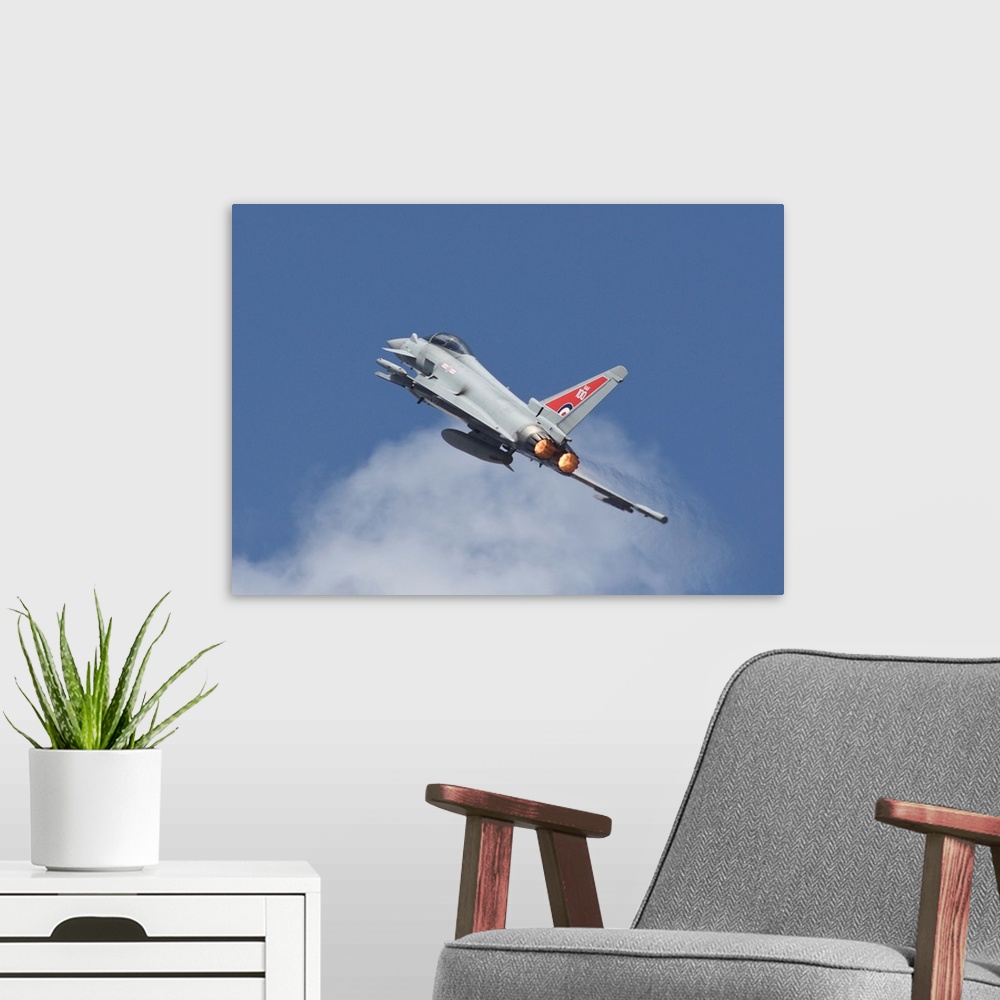 A modern room featuring Royal Air Force Typhoon FGR4 taking off.