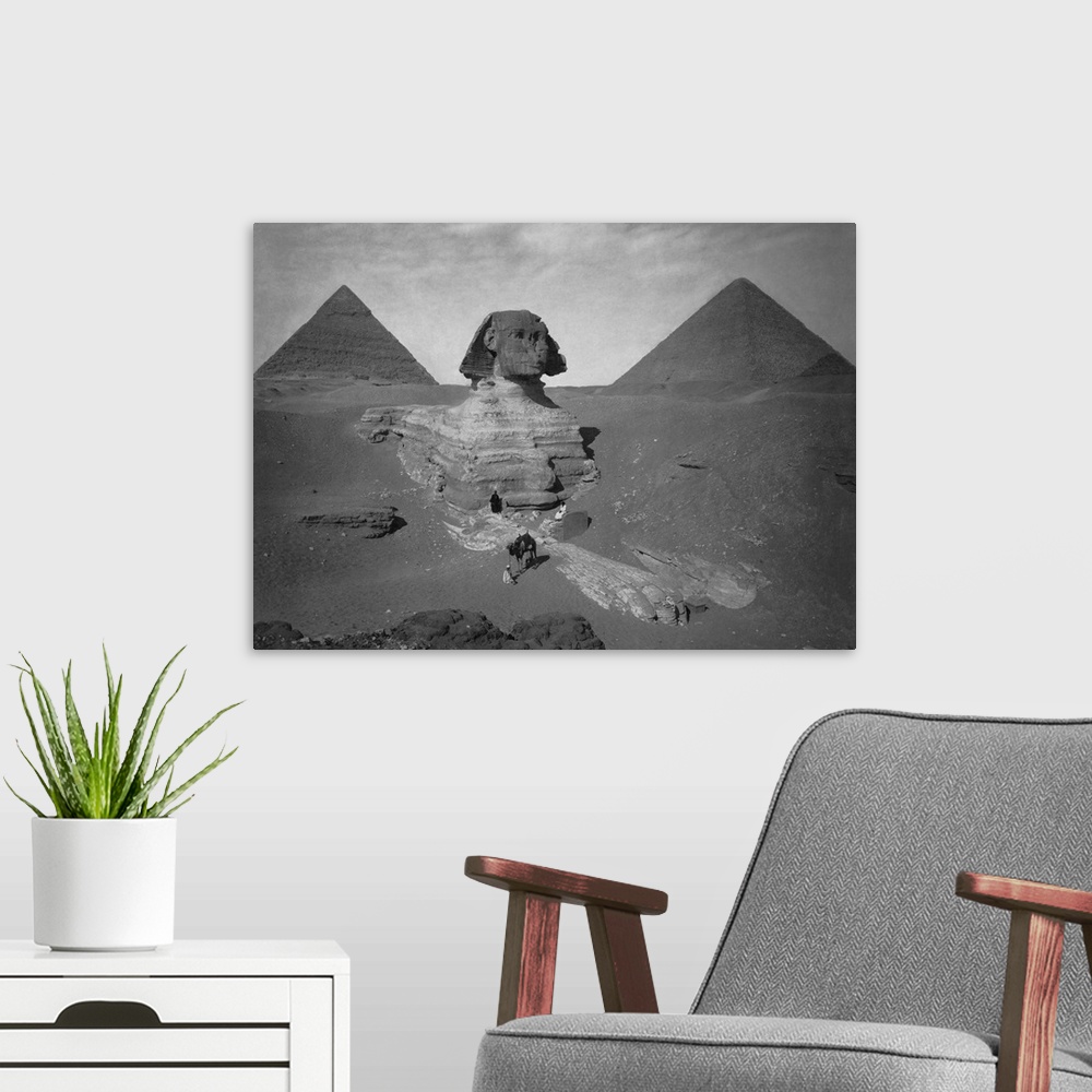 A modern room featuring Vintage Egyptian history photo of the partially excavated Sphinx of Giza.