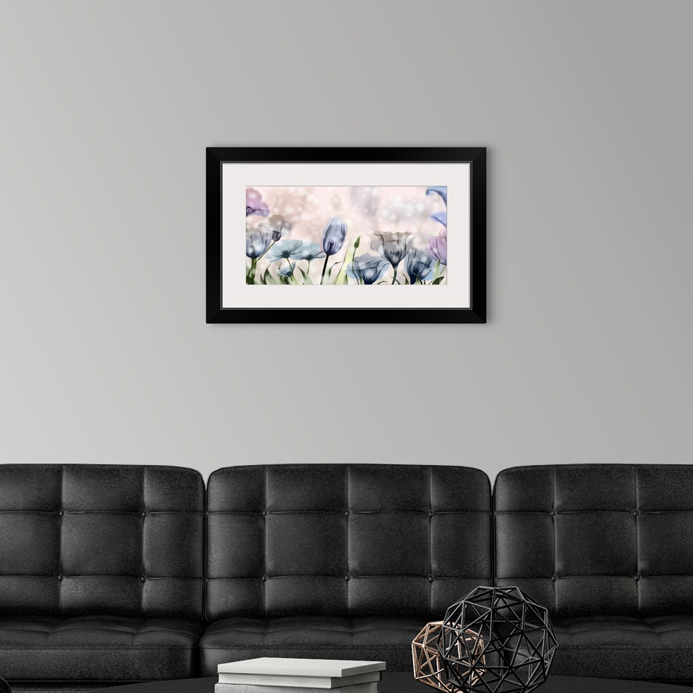 A modern room featuring X-ray style photograph of pink and blue flowers in a garden with bokeh lights.