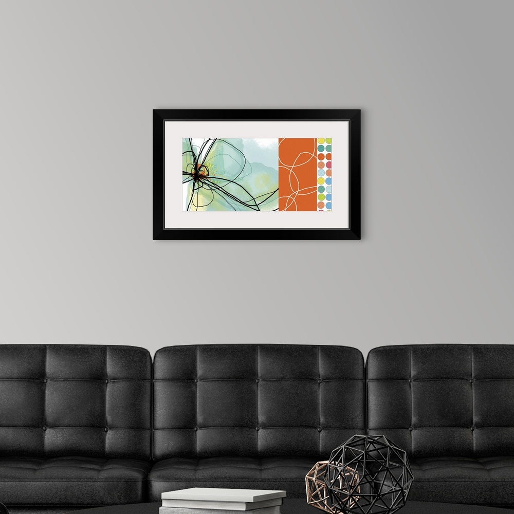 A modern room featuring Abstract canvas print of the outline of a flower on the left and multicolored polka dots on the r...