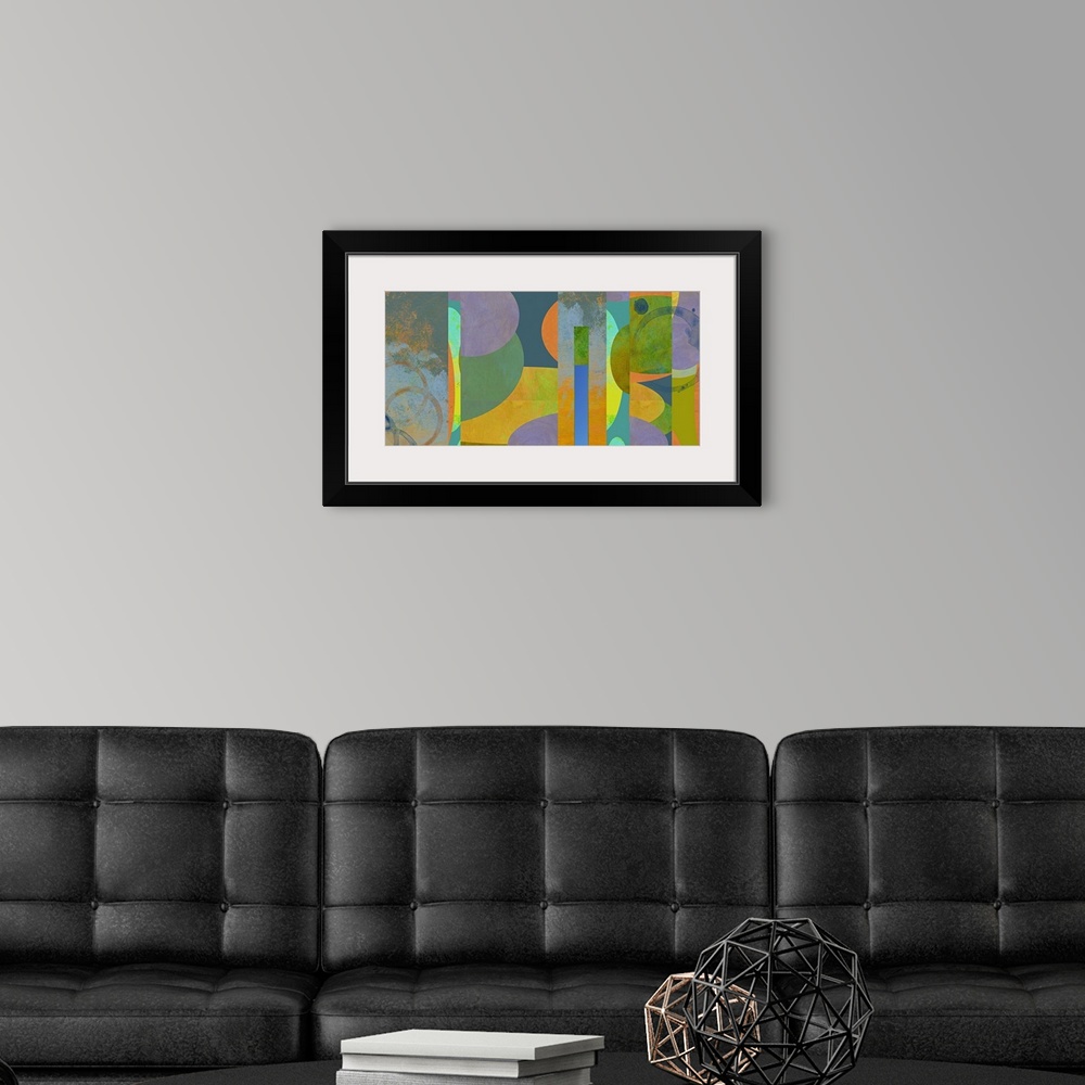 A modern room featuring A collage of original acrylic paintings all woven together to create a colorful image.