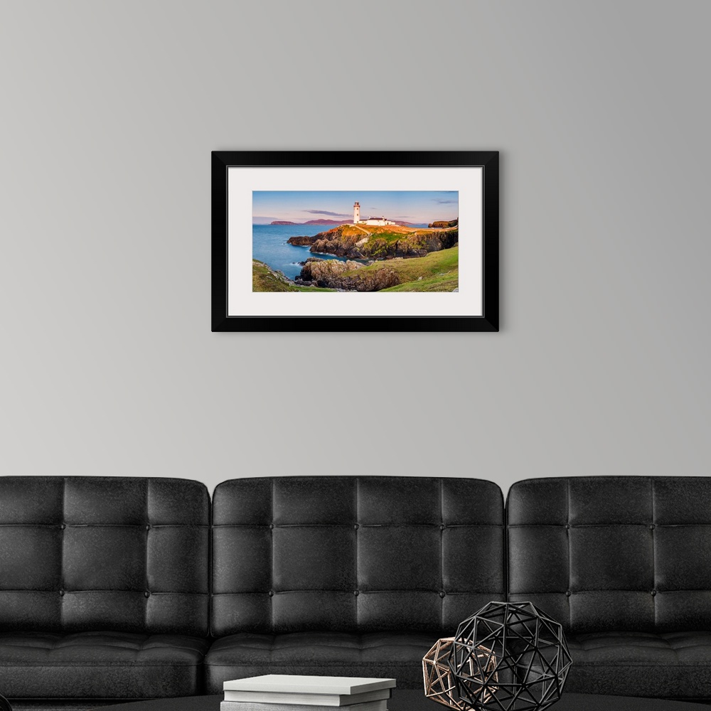A modern room featuring Fanad Head (Fanaid) lighthouse, County Donegal, Ulster region, Ireland, Europe. Panoramic view of...