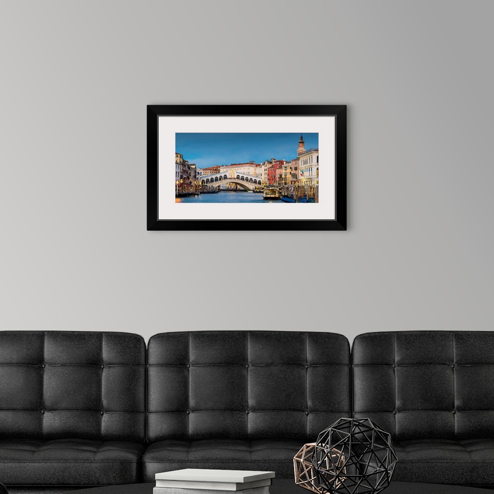 A modern room featuring Rialto Bridge At Dusk, Venice, Veneto, Italy.