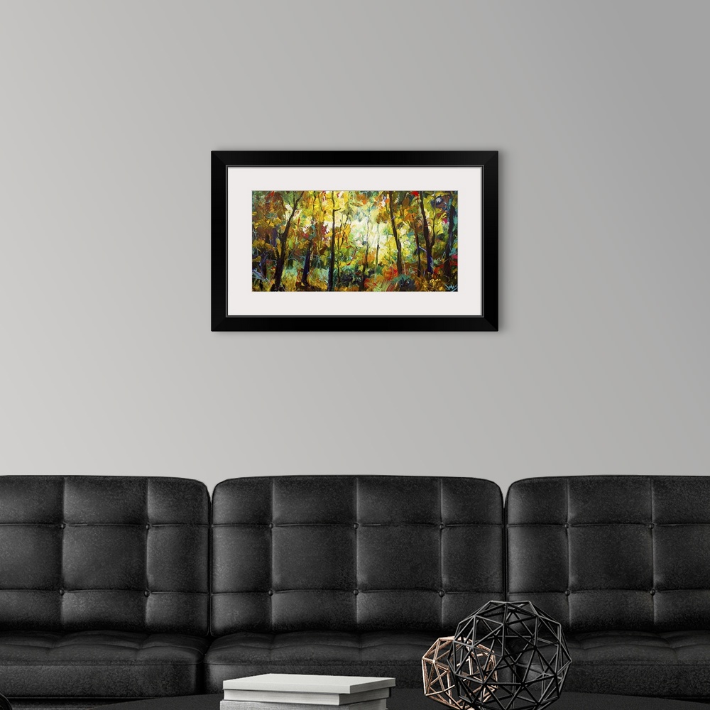 A modern room featuring Contemporary painting of a forest scene shrouded in darkness with a glowing light seen in the dis...
