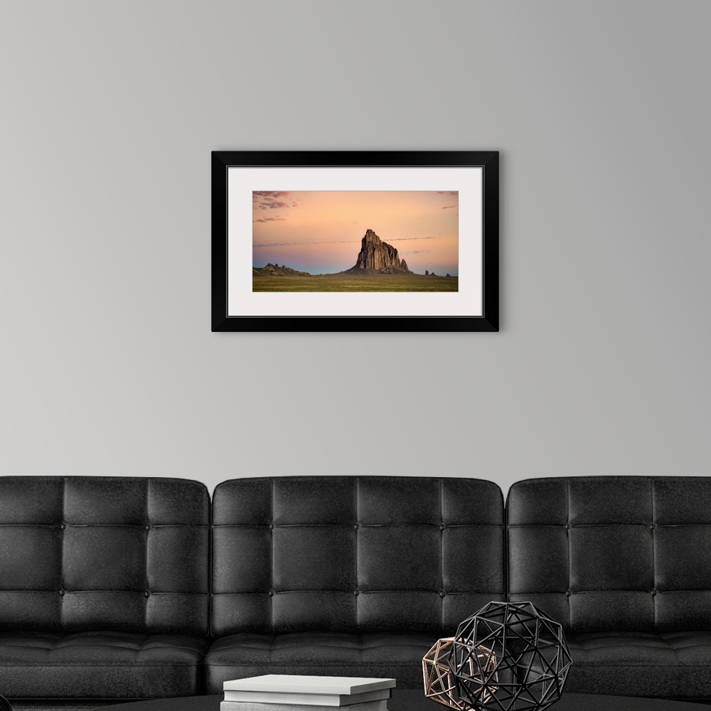 A modern room featuring Sunset Over Shiprock, Shiprock