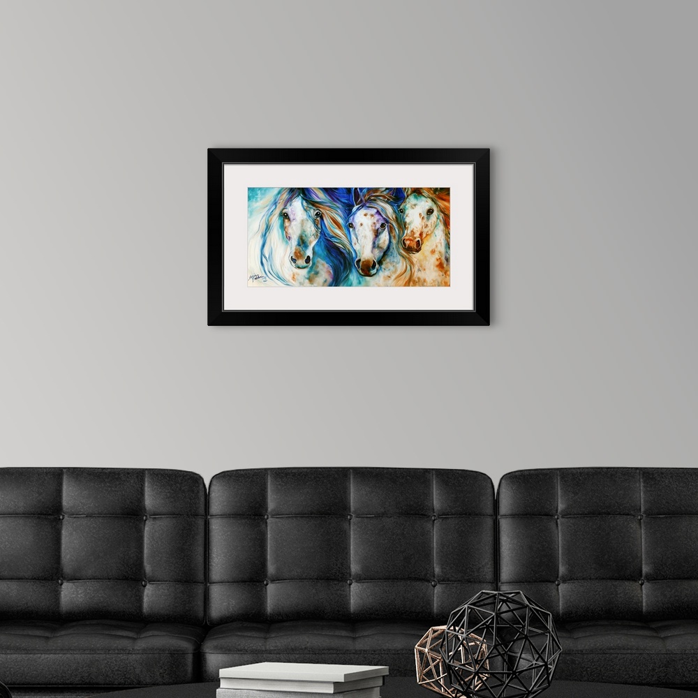 A modern room featuring Panoramic painting of three Appaloosa horses with playful hues and beautifully flowing manes.