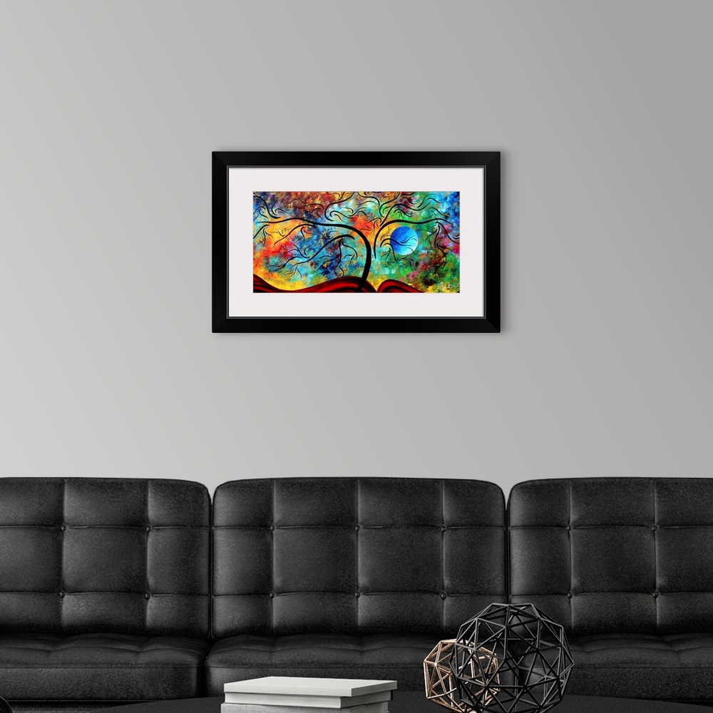 A modern room featuring Panoramic contemporary art portrays a bare tree as it sits on a rolling hill in front of a backgr...