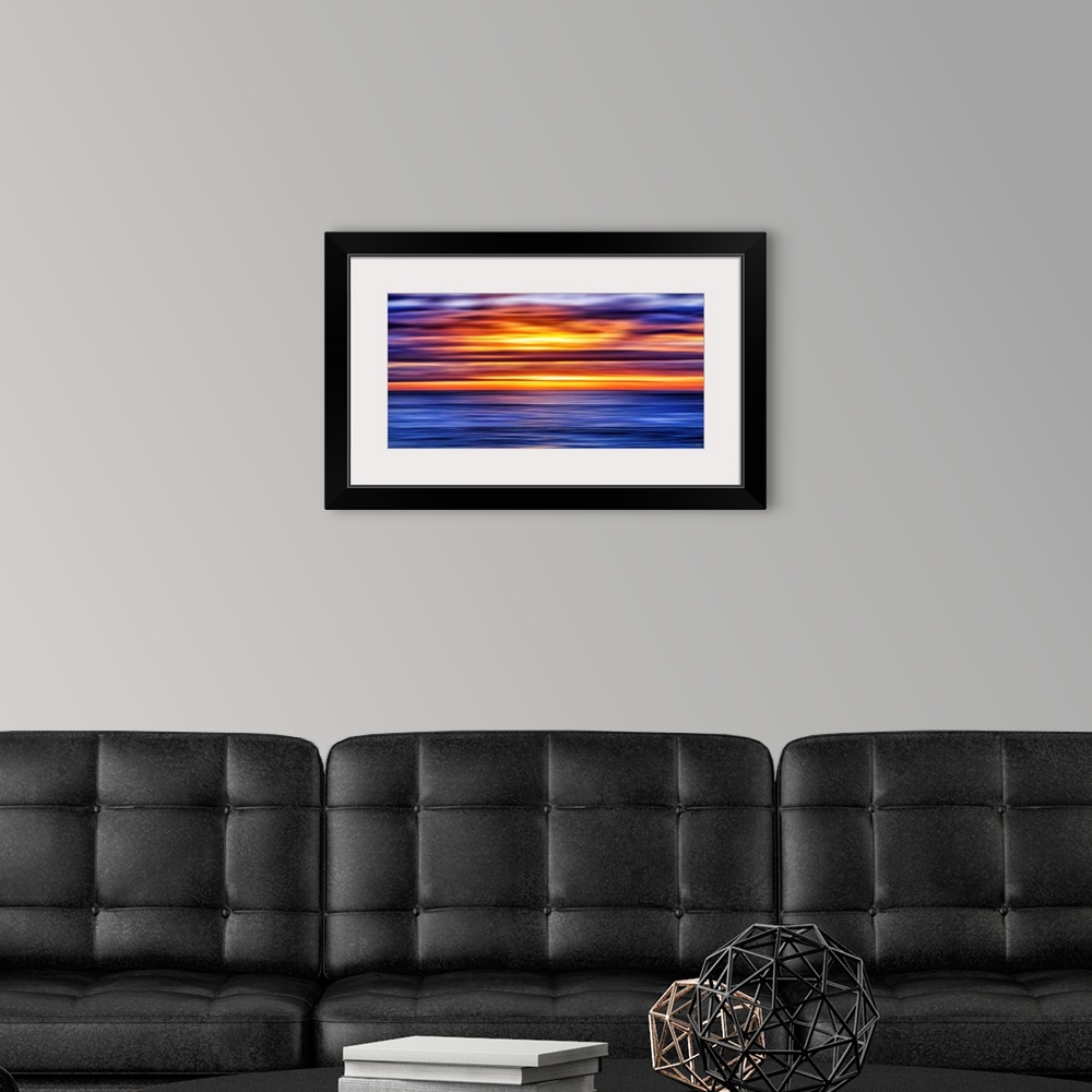 A modern room featuring A sunset in Carmel-by-the-Sea that the artist has given a contemporary touch. The depth of the pi...