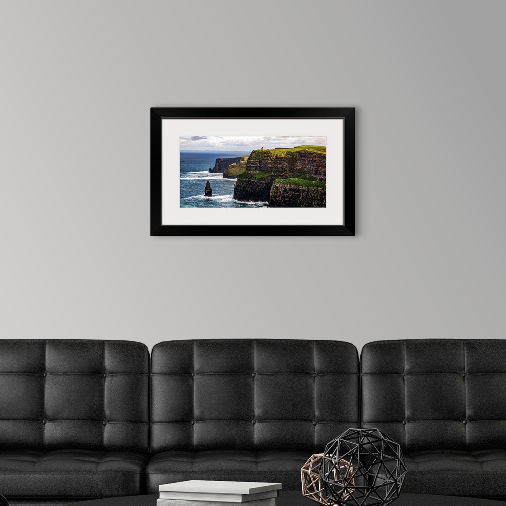 A modern room featuring Panoramic photograph of the Cliffs of Moher with O'Brien's Tower seen in the distance, marking th...