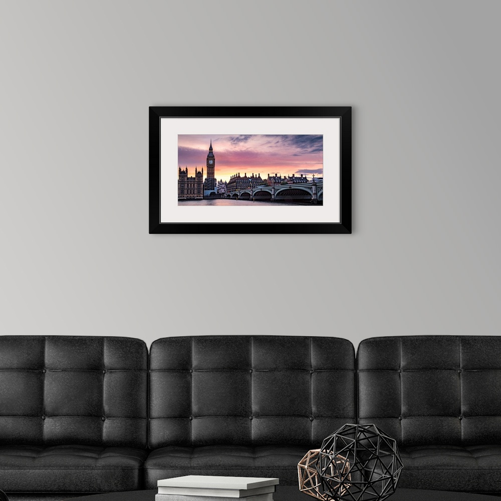 A modern room featuring Panoramic photograph of Big Ben and the Westminster Bridge with a pink and purple sunset.