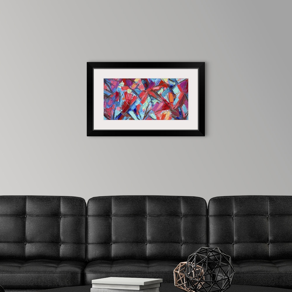 A modern room featuring Vivid blue and red abstract artwork.