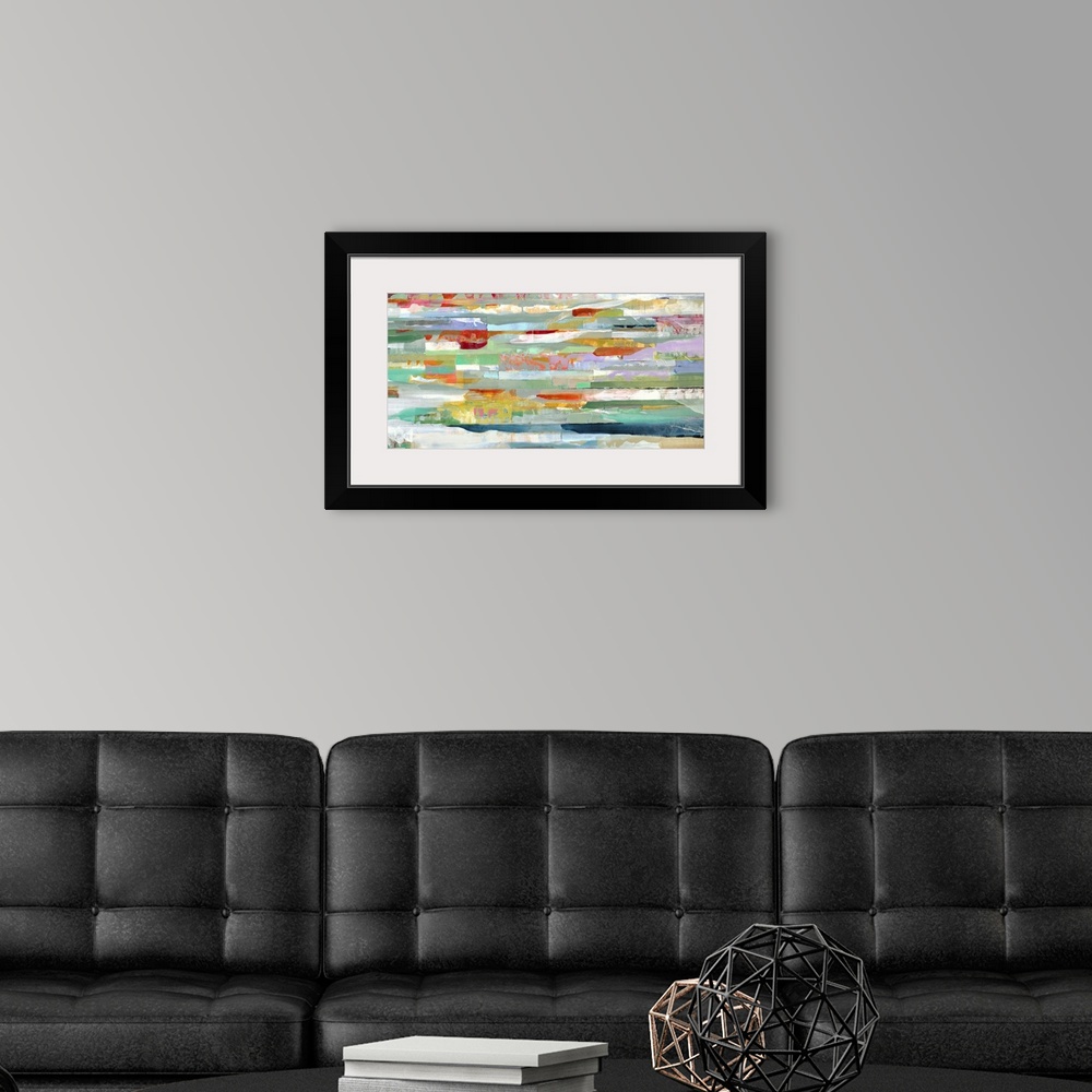 A modern room featuring A contemporary abstract painting of multi-colored horizontal lines.