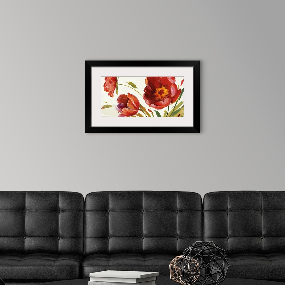A modern room featuring Contemporary art piece of giant red poppy flowers blowing in the invisible wind.