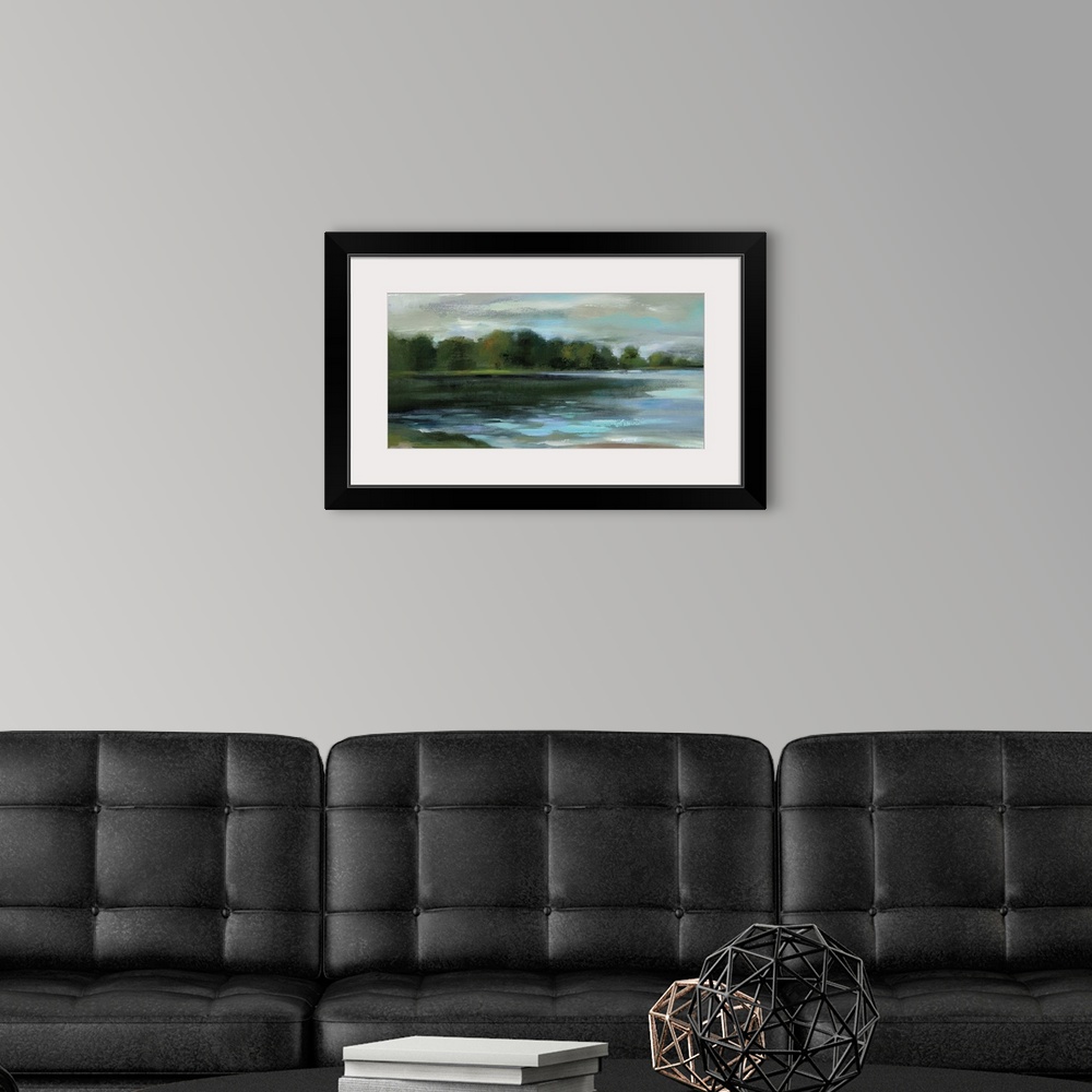 A modern room featuring Contemporary landscape painting of a lakeside lined with trees.
