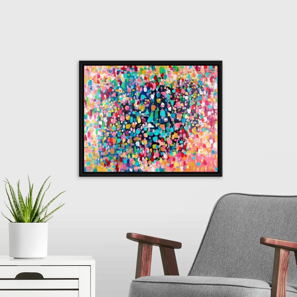 A modern room featuring Contemporary abstract painting of vivid multicolored spots, resembling confetti.
