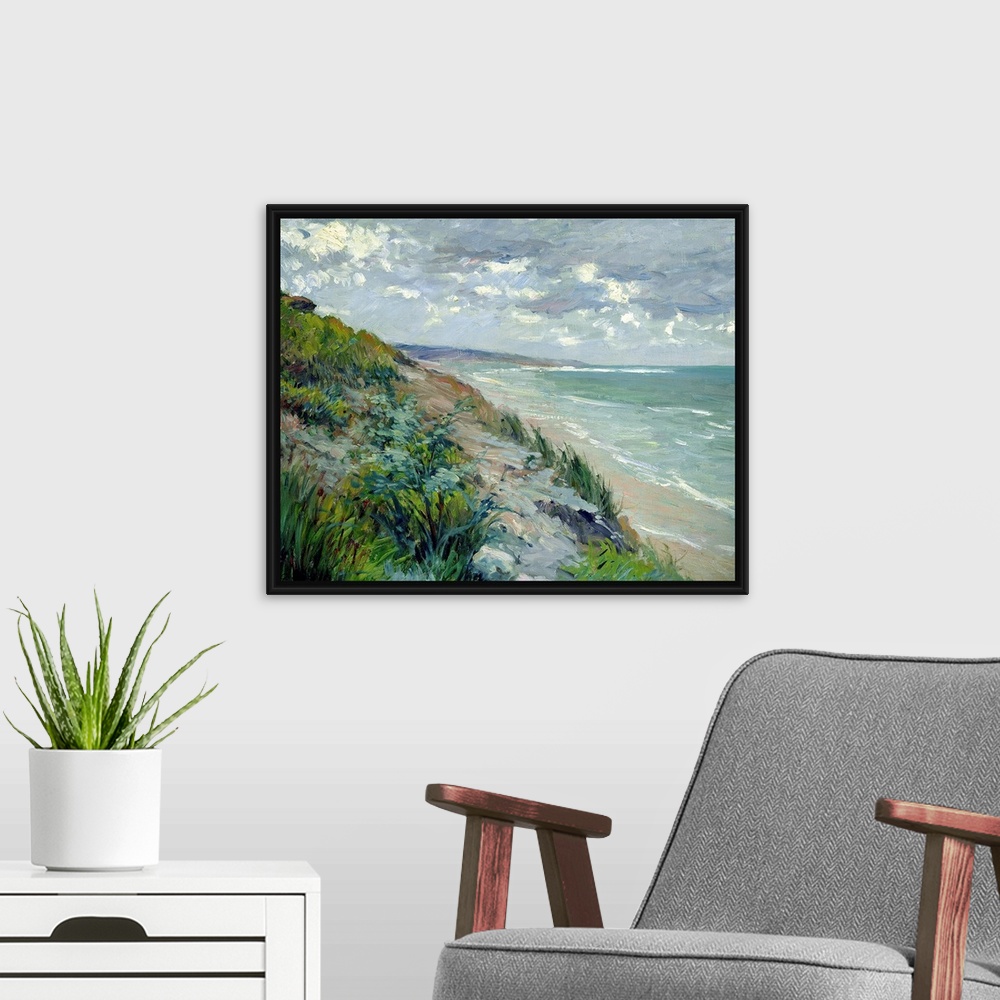 A modern room featuring Impressionist landscape painting of the beach and a sea cliff covered in grass on a cloudy day.