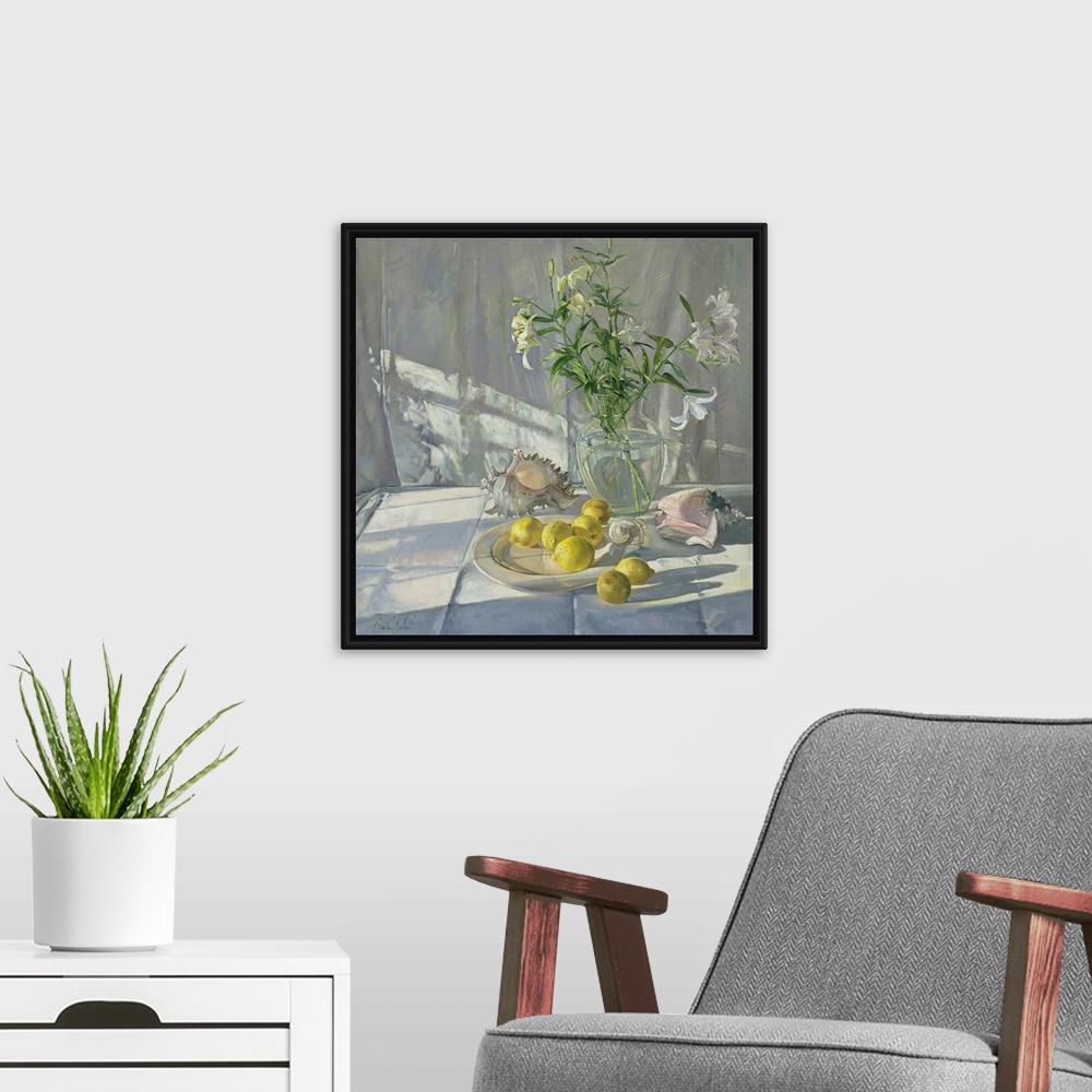 A modern room featuring Square oil painting of flowers in a vase with sea shells scattered around and lemons on a plate.