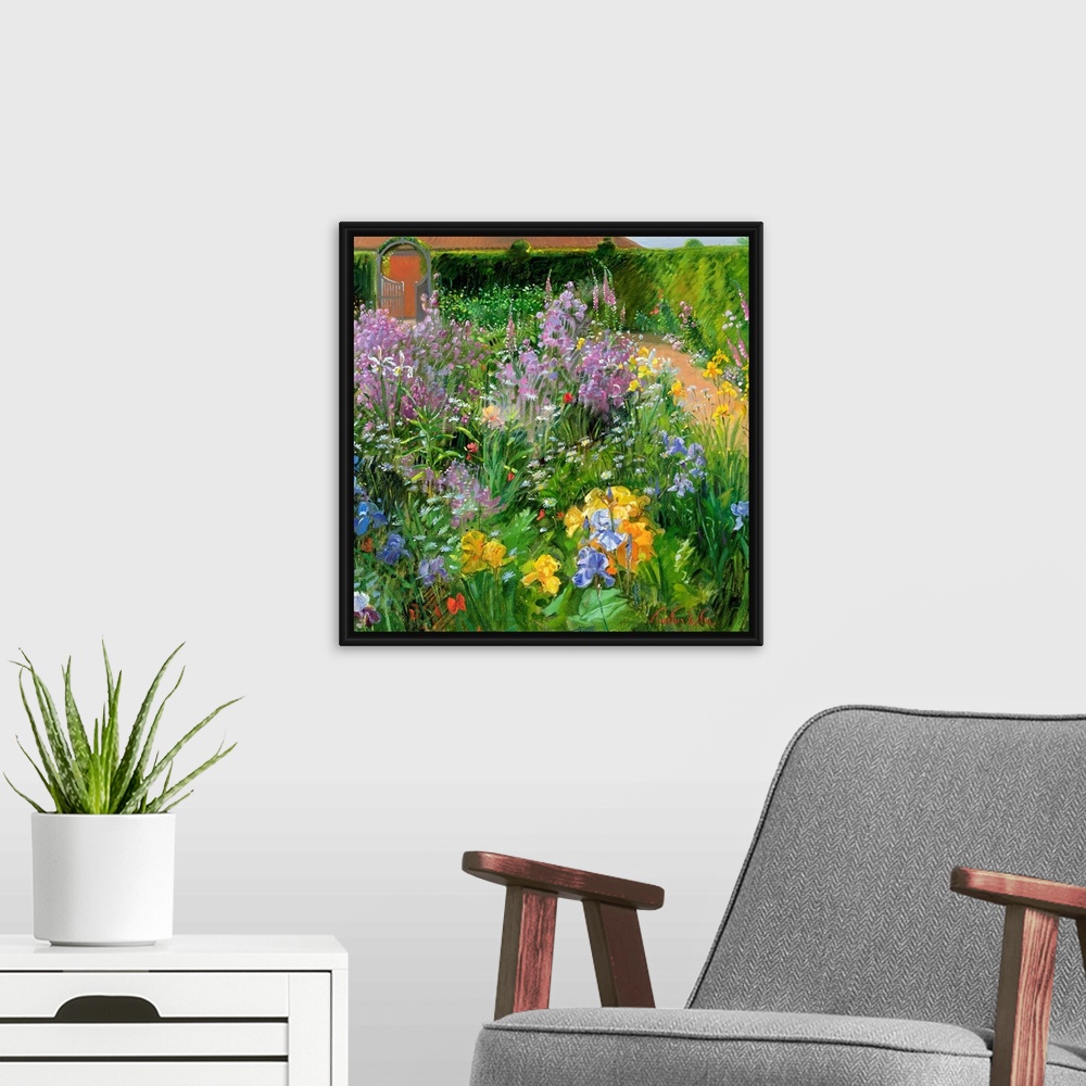 A modern room featuring Square painting of different types and colors of flowers planted in a garden.