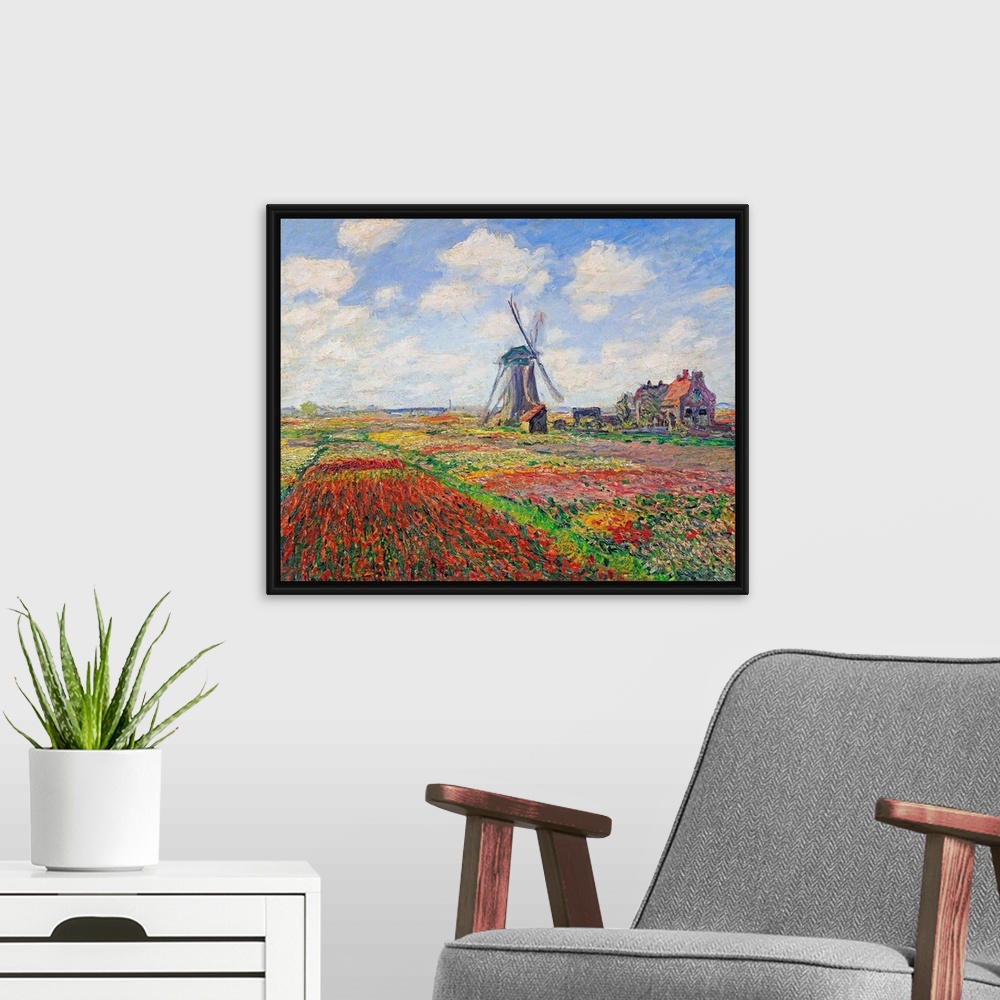 A modern room featuring Oil painting of a windmill in a field of bright flowers under a sky with puffy clouds.