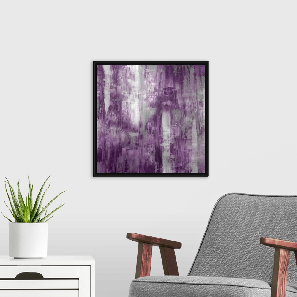 A modern room featuring Square abstract painting with silver and purple hues running down the canvas.