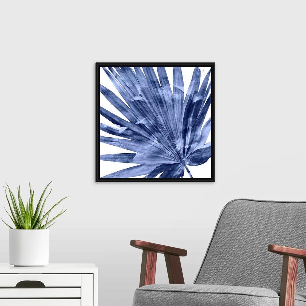A modern room featuring Square decor with an indigo silhouette of a palm leaf on a solid white background.