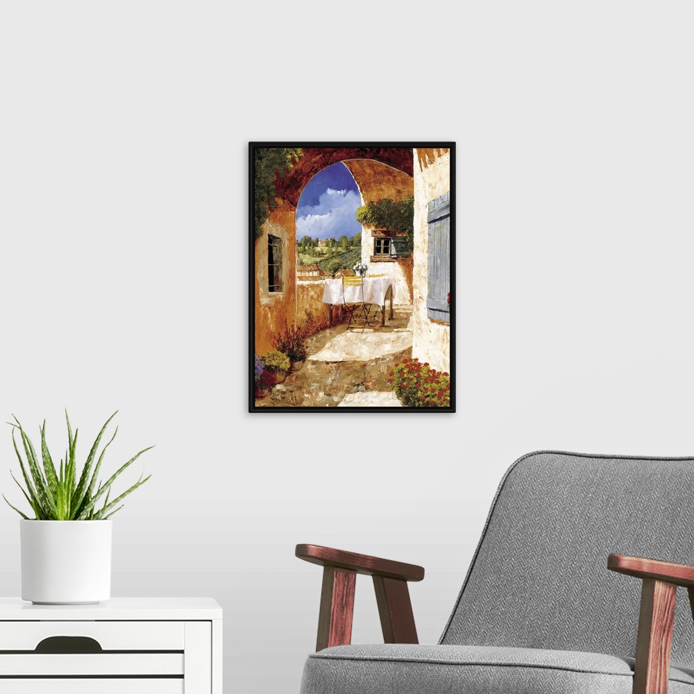 A modern room featuring Contemporary artwork of a Tuscan villa on a sunny day.