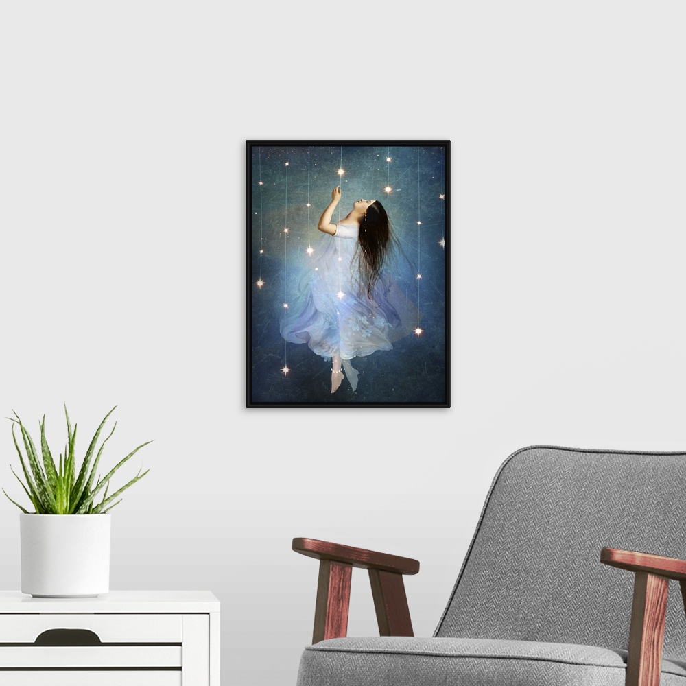 A modern room featuring A conceptual artwork of a female floating in stars.