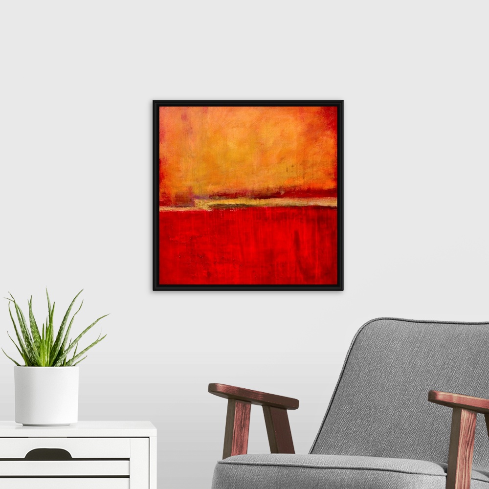 A modern room featuring Square abstract artwork in fiery red and orange tones with simple, bold areas of color, resemblin...