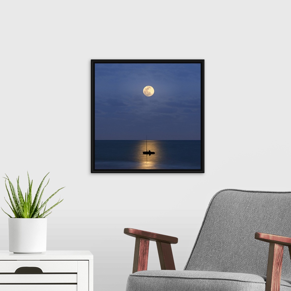A modern room featuring Silhouette sailboat with moon