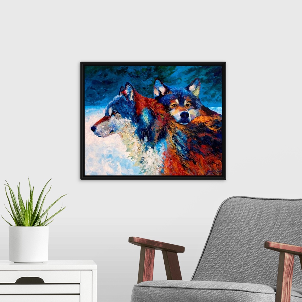 A modern room featuring Contemporary painting of two wolves in the snow at night.