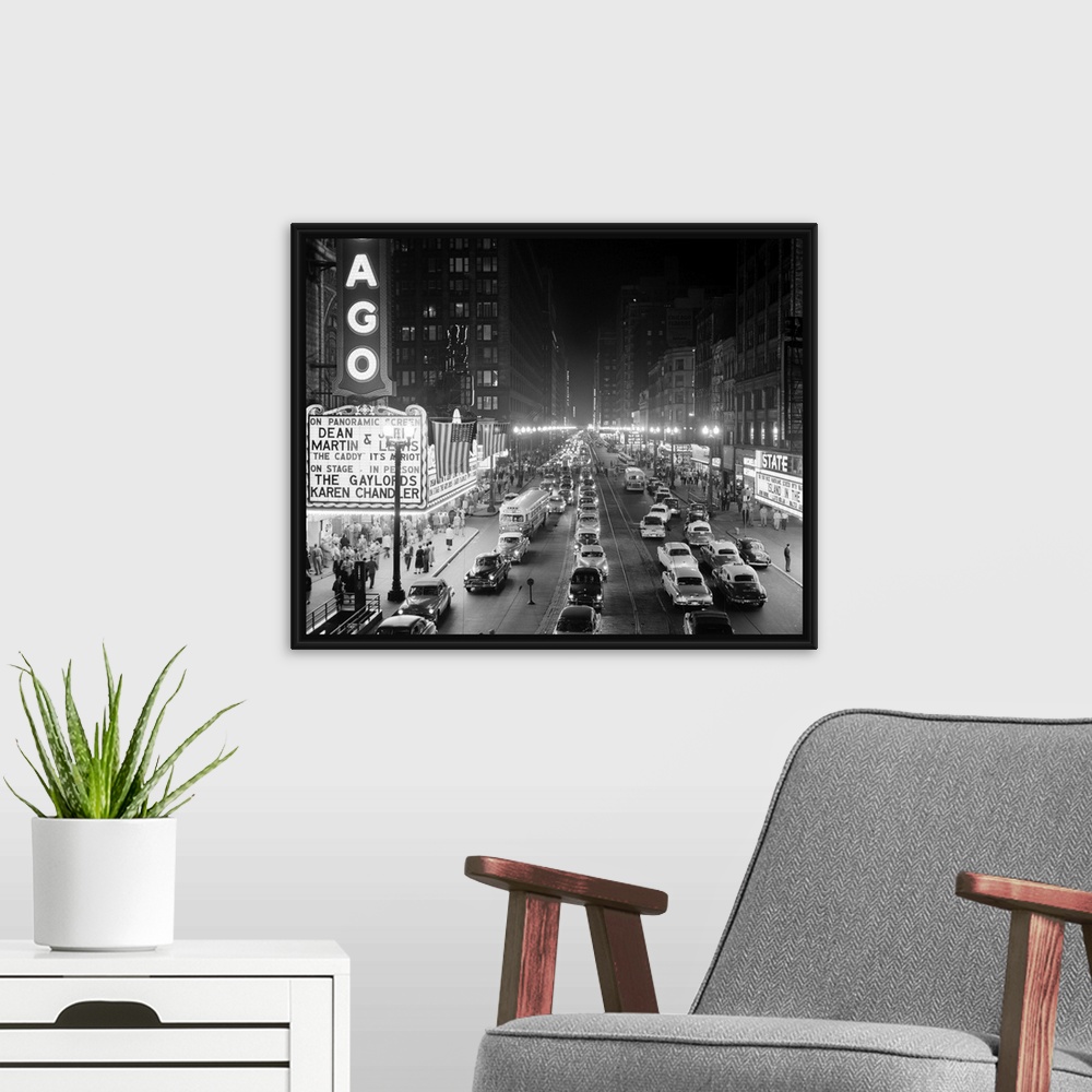 A modern room featuring 1950's 1953 Night Scene Of Chicago State Street With Traffic And Movie Marquee With Pedestrians O...