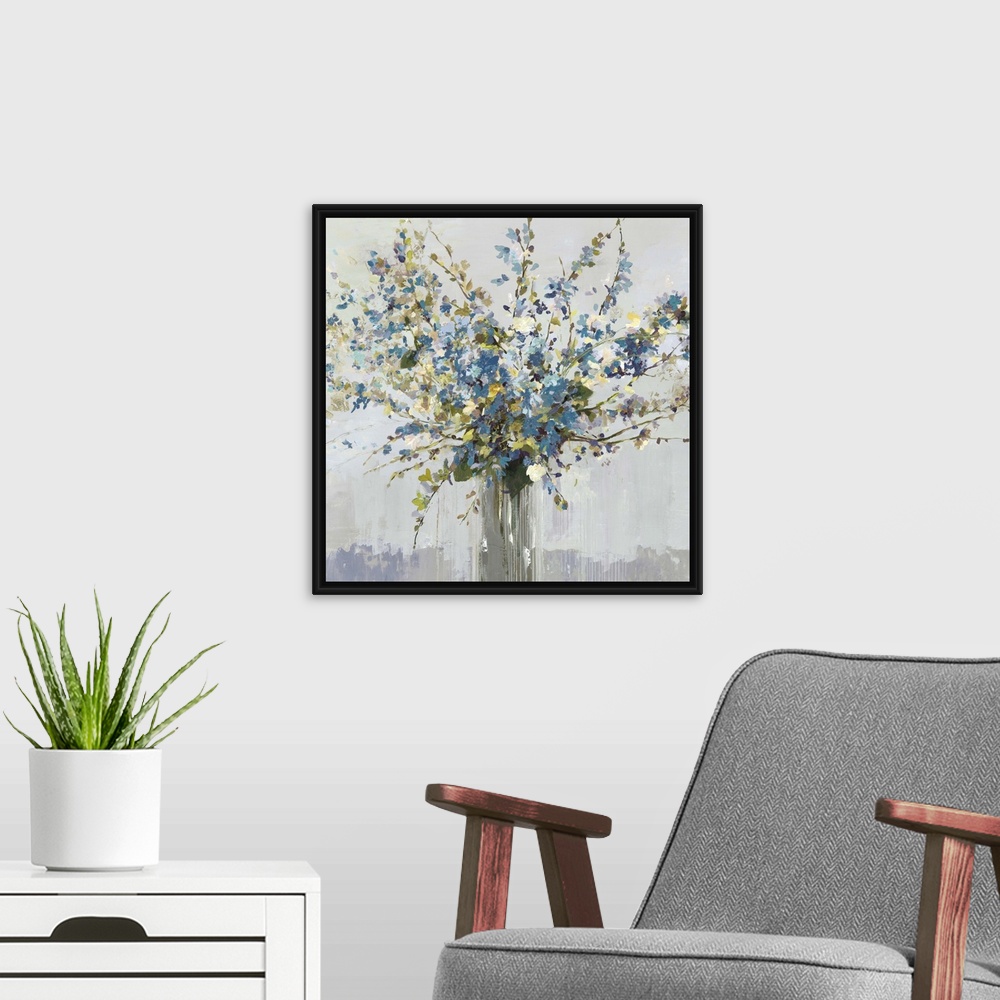 A modern room featuring Contemporary artwork of a vase full of blue and white flowers.