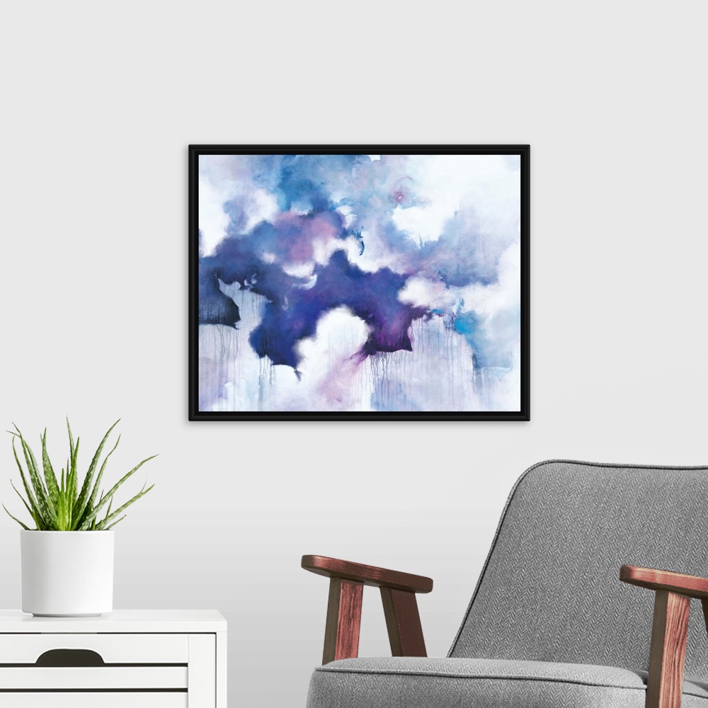 A modern room featuring Abstract contemporary painting in blue and purple tones, resembling a cloudy sky.