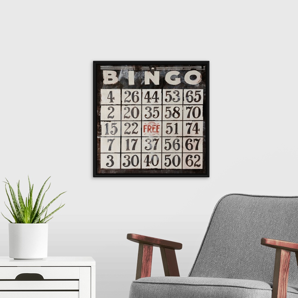 A modern room featuring This large piece has an antique style Bingo card that takes up the entire face of artwork.