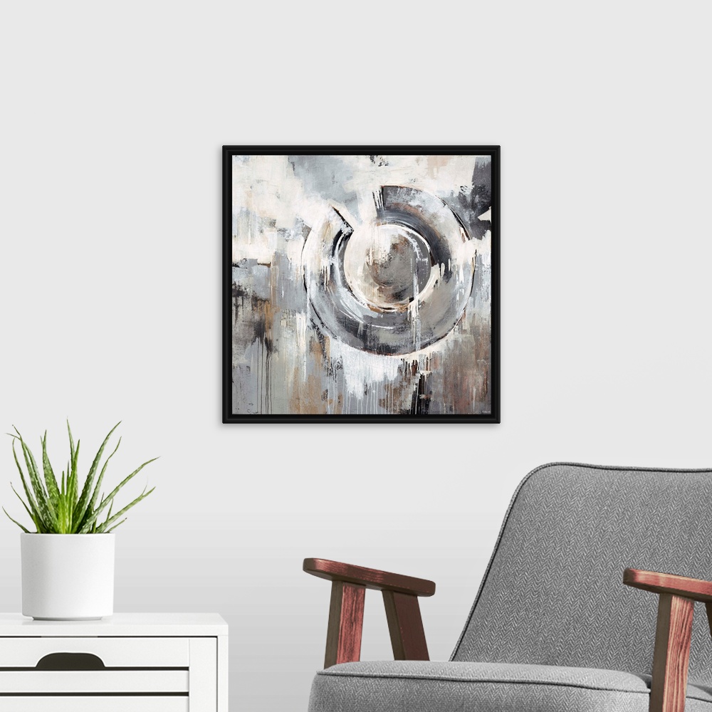 A modern room featuring Abstract painting in neutral and earth tones of a large circular shape surrounded by dripping pat...