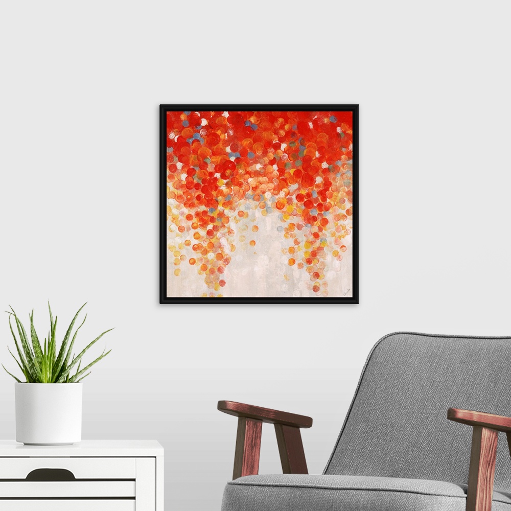A modern room featuring Abstract painting of a large cluster of gumballs in warm tones that appear to be raining downward...