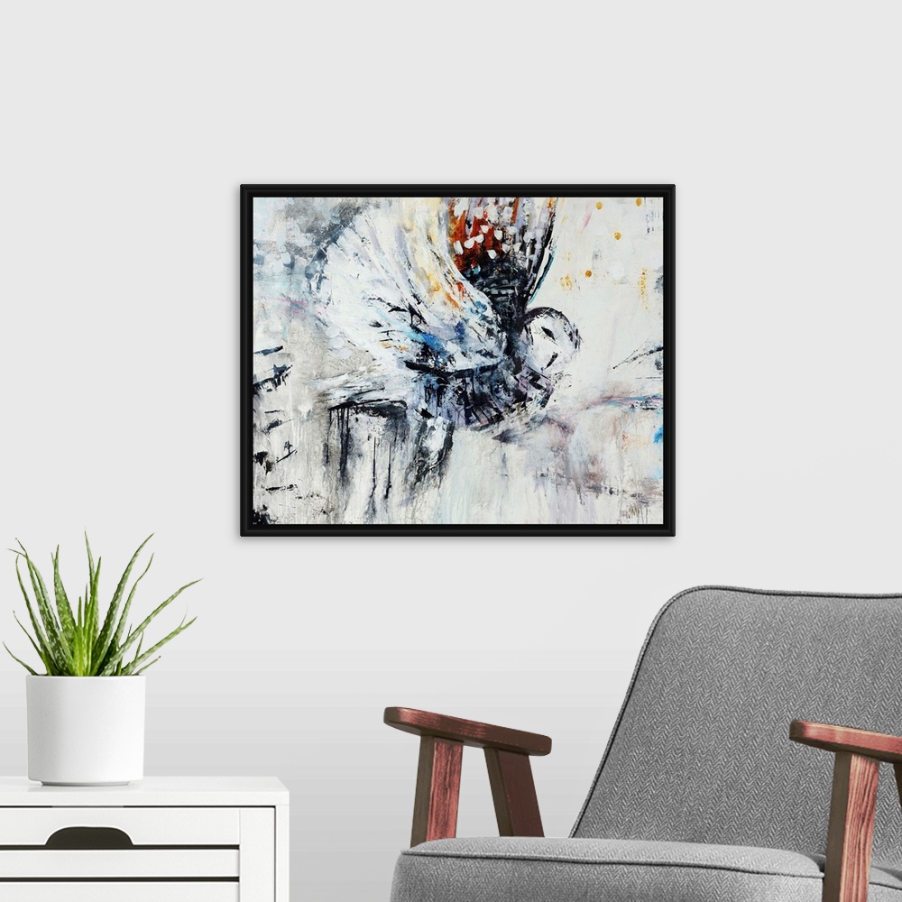 A modern room featuring Contemporary abstract painting of an owl in flight.