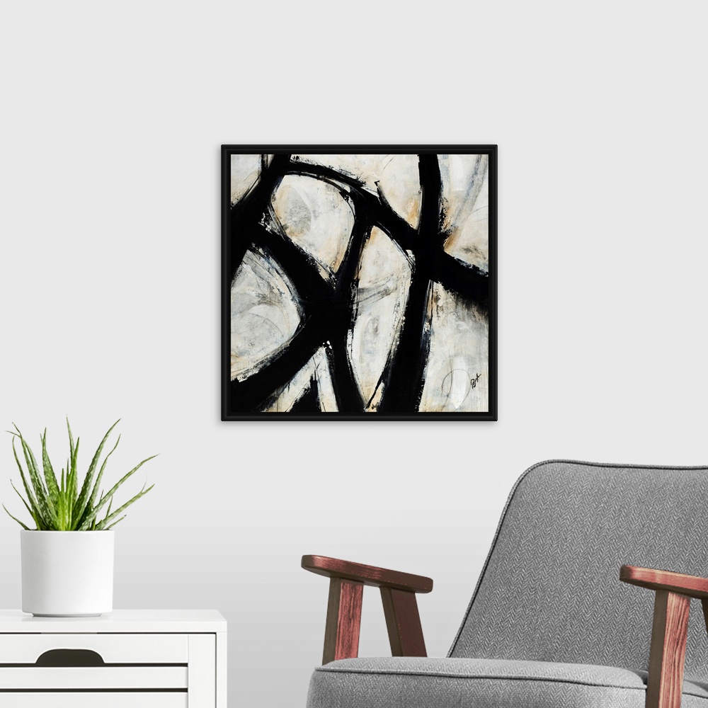 A modern room featuring Contemporary abstract painting of black brush strokes over a netural background.