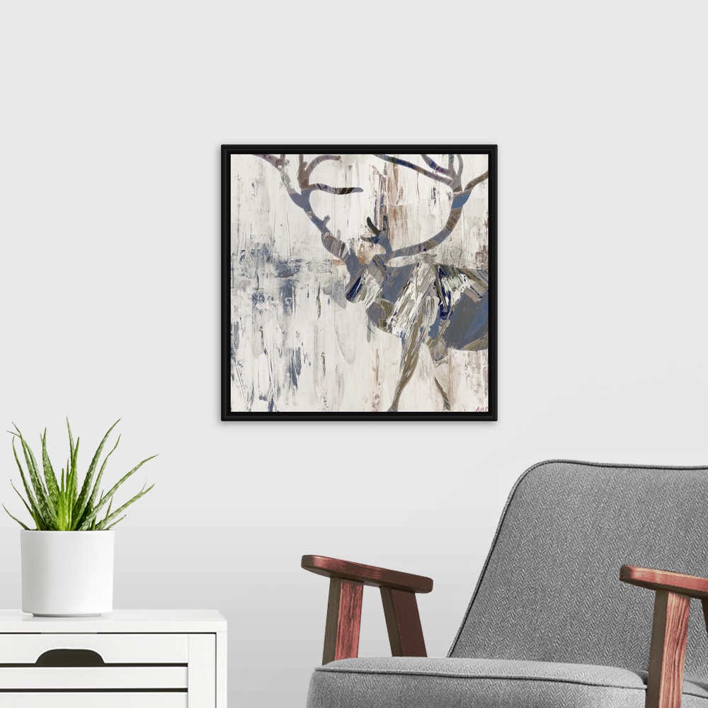A modern room featuring Silhouette of a deer with large antlers in earth tones.