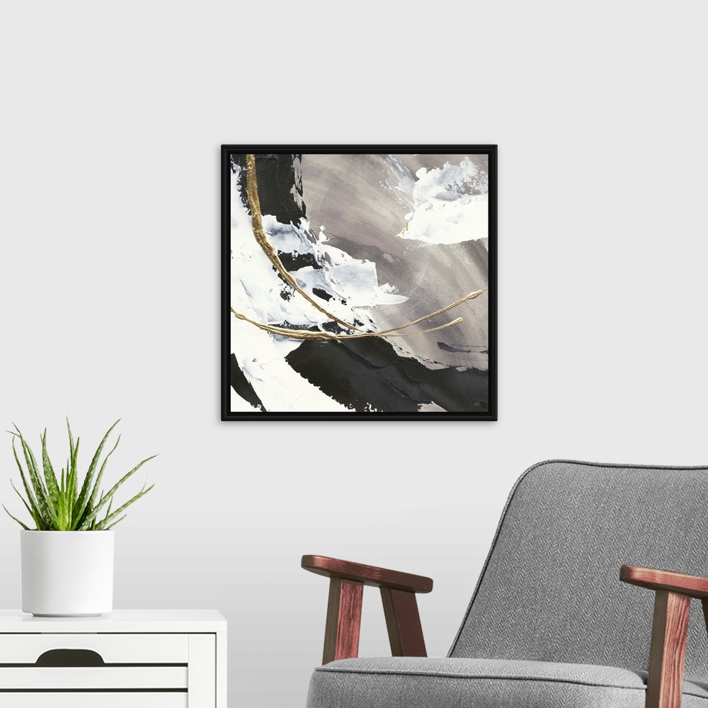 A modern room featuring Large abstract painting of various brush strokes of gray, black and white with gold line accents.